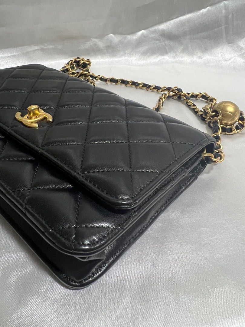 Chanel pearl wallet on chain top