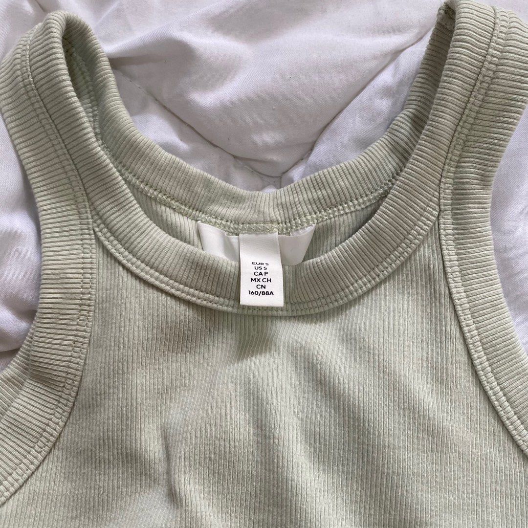 H&M Light Sage Green Tank Top (Category: Sleeveless) located in Muntinlupa City. Submitted by coldbrews (Listing ID 1216207508, Image 3). Description: please read the FULL description before inquiring! size: s condition: brand new! this green tank is a wardrobe essential, the fabric is absolutely soft and stretchy! 🏷️ mop GCash ONLY 📮 shipping from Muntinlupa City via GoGo Express ONLY (Metro Manila rates are ₱80) can do Lalamove for same-day d