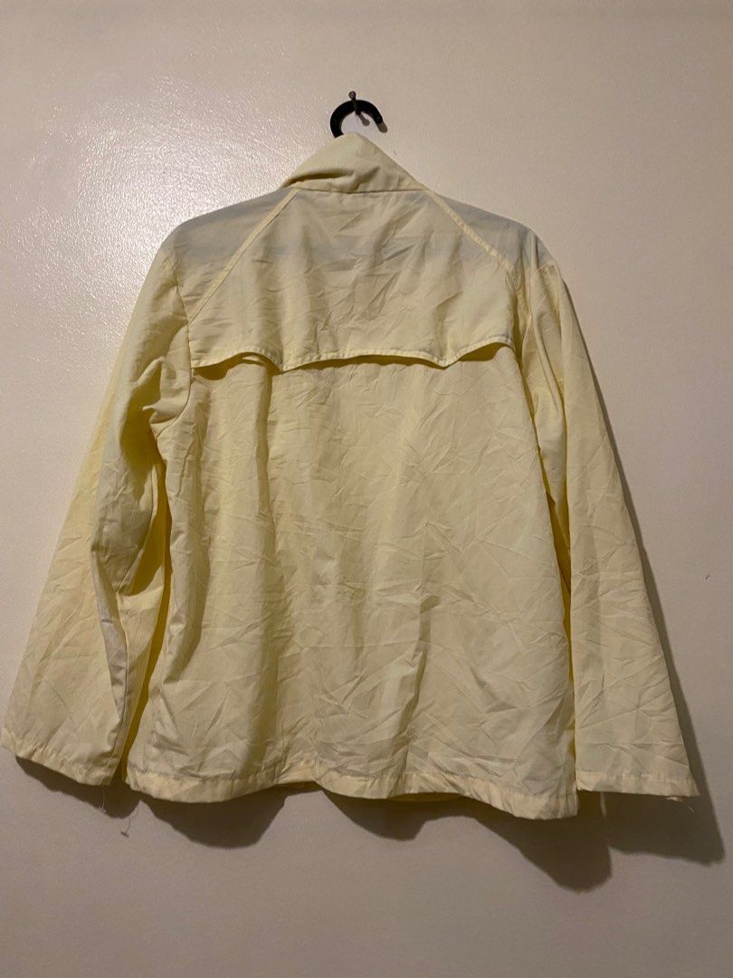 Pastel sales yellow windbreaker