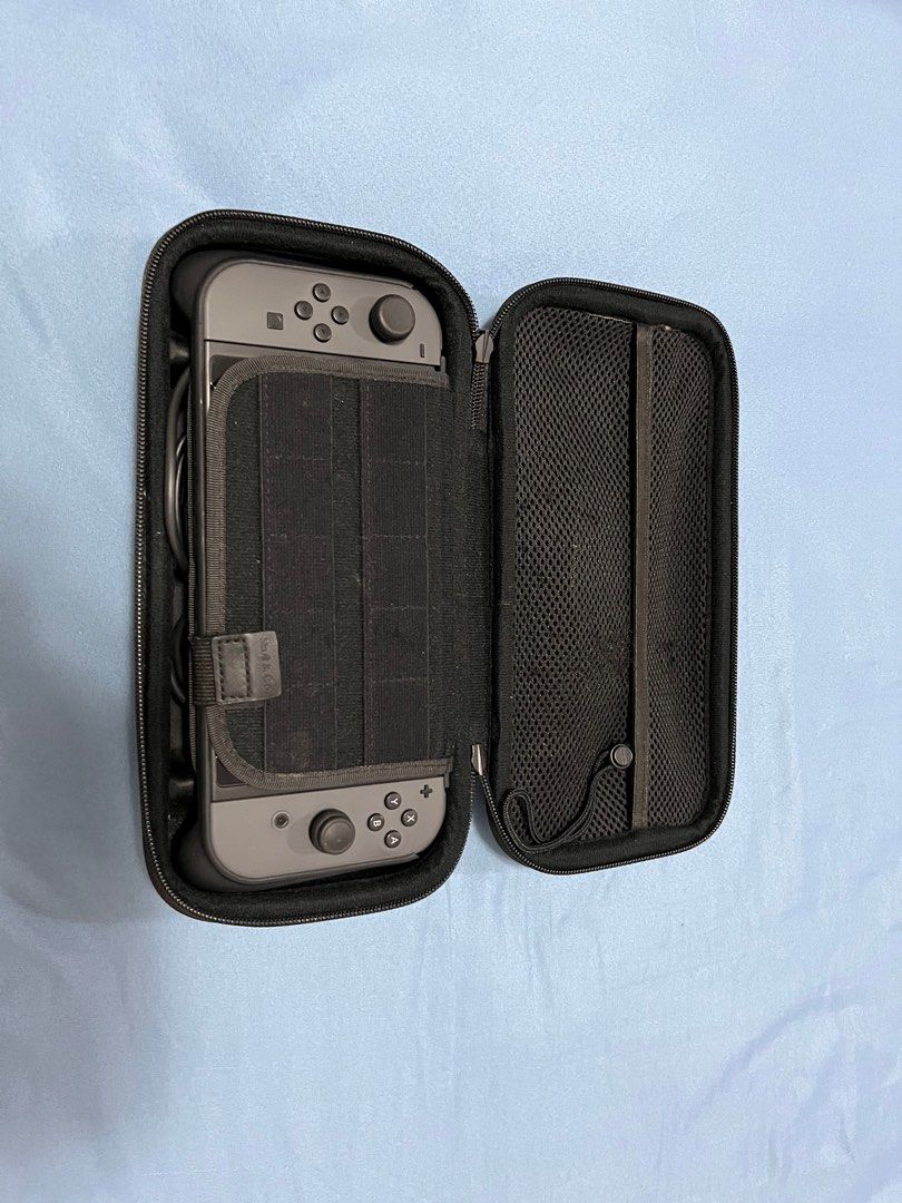 Nintendo Switch with digital games and controller (Category: Nintendo) located in Makati City. Submitted by ecscz (Listing ID 1216259350, Image 3). Description: .