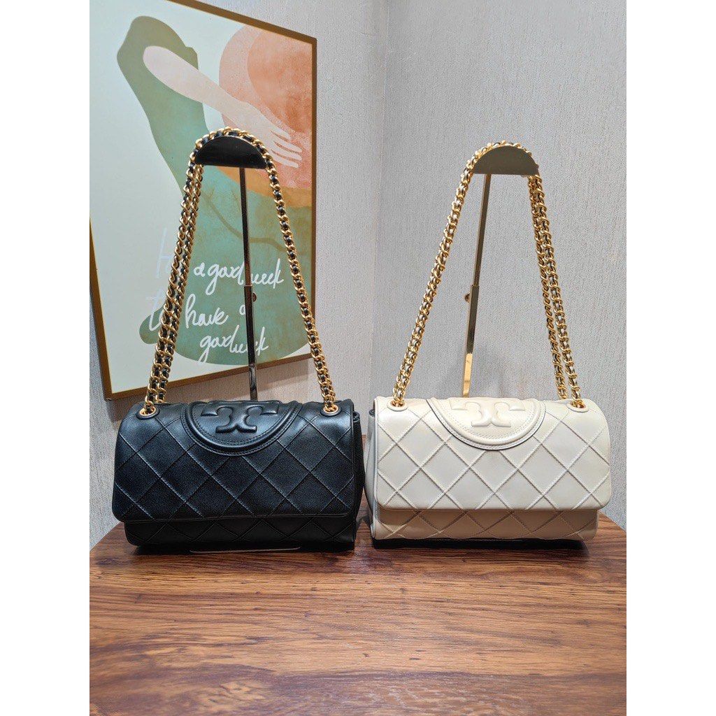 Quilted tory burch bag top