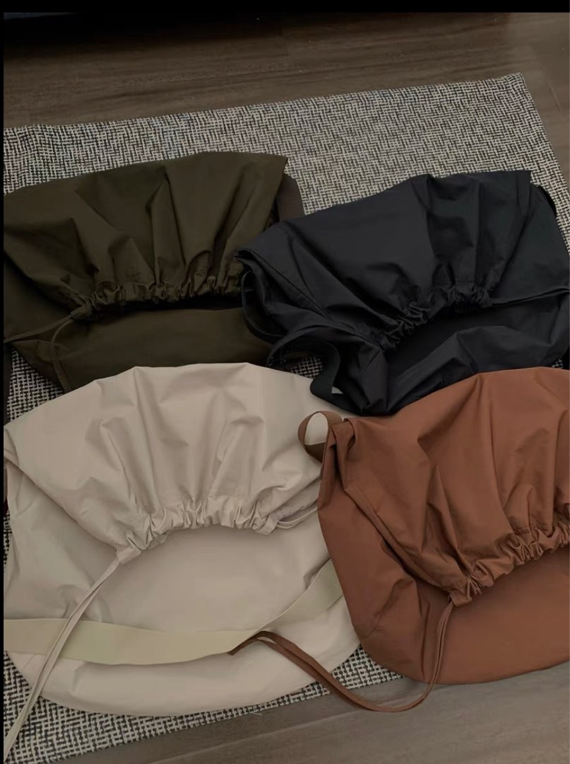 Uniqlo U drawstring bag, Women's Fashion, Bags & Wallets, Crossbody