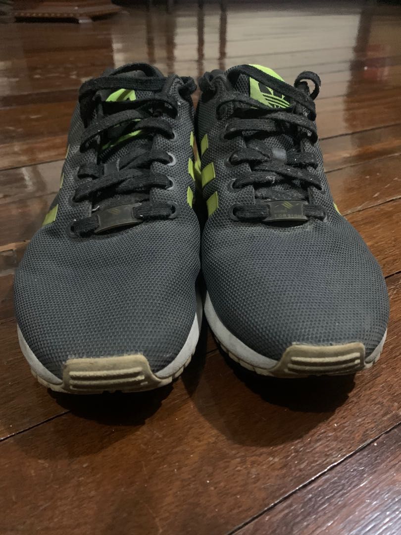 Adidas ZX Flux (Category: Sneakers) located in Quezon City. Submitted by hellogoodbri (Listing ID 1212873391, Image 3). Description: - In good condition; cosmetic wear is noticeable. Cracks on the sole but still intact and usable - Size 8M - no more box - RFS: decluttering - message for inquiries.