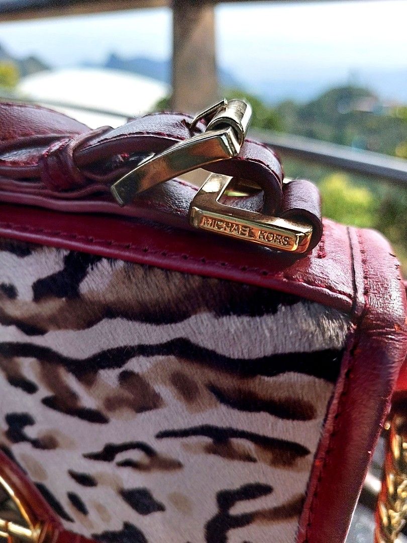 Mk cheetah sale purse