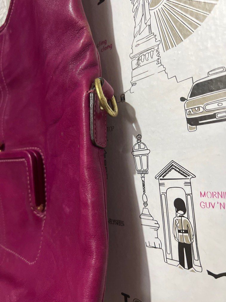 Coach Magenta Handbag/Crossbody (Category: Cross-body Bags) located in Makati City. Submitted by allaboutthrift___ (Listing ID 1212835823, Image 3). Description: STILL VERY CLEAN, IN VERY GOOD CONDITION, LINING IS CLEAN, STITCHING IS STILL GOOD *DOES NOT COME WITH STRAP TO MAKE INTO CROSSBODY, BOUGHT IT ONLINE WITHOUT THE STRAP* #sell123.