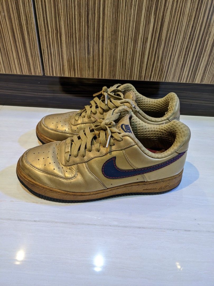 Golden nikes top