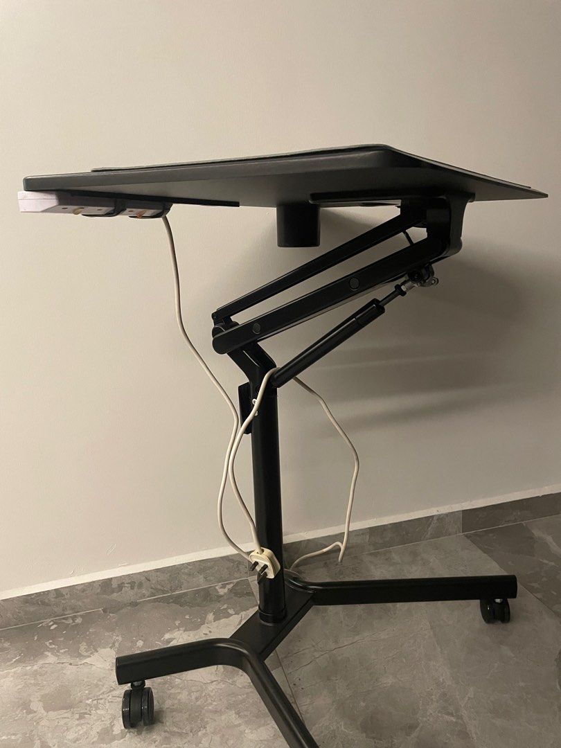Height adjustable table (Category: Tables & Sets) located in Singapore. Submitted by magadoogoo (Listing ID 1212964967, Image 3). Description: Lightly used height adjustable table. Discount if bought with portable monitor / desktop arm and laptop mount.