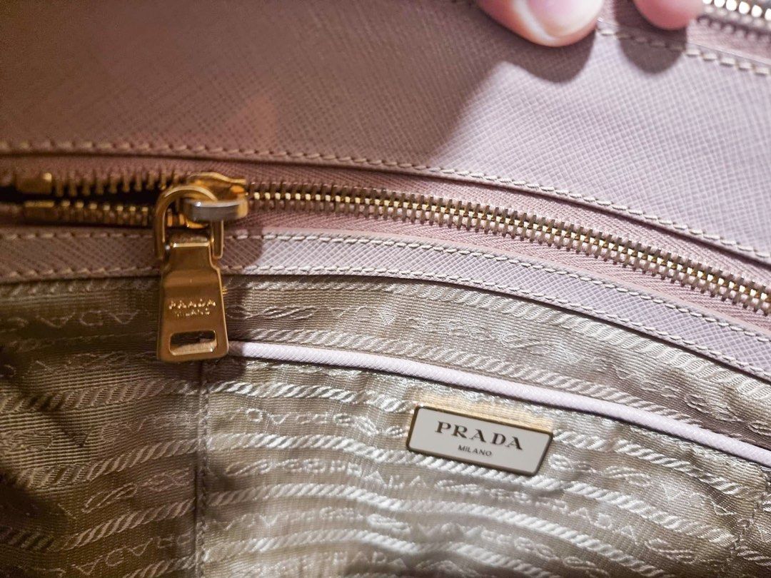 Prada Saffiano Galleria Medium (Category: Luxury Bags & Wallets) located in Quezon City. Submitted by shop_lala (Listing ID 1212858973, Image 3). Description: Prada Saffiano Galleria Medium in Beige Two way Medium Material: saffiano leather Size: 13” x 10 Condition: 8/10 With Entrupy Certificate and authenticity card No dust bag and paper bag Sourced at Bag Finder (IG) With minimal signs of usage and minor scuffs but barely noticeable Very well t