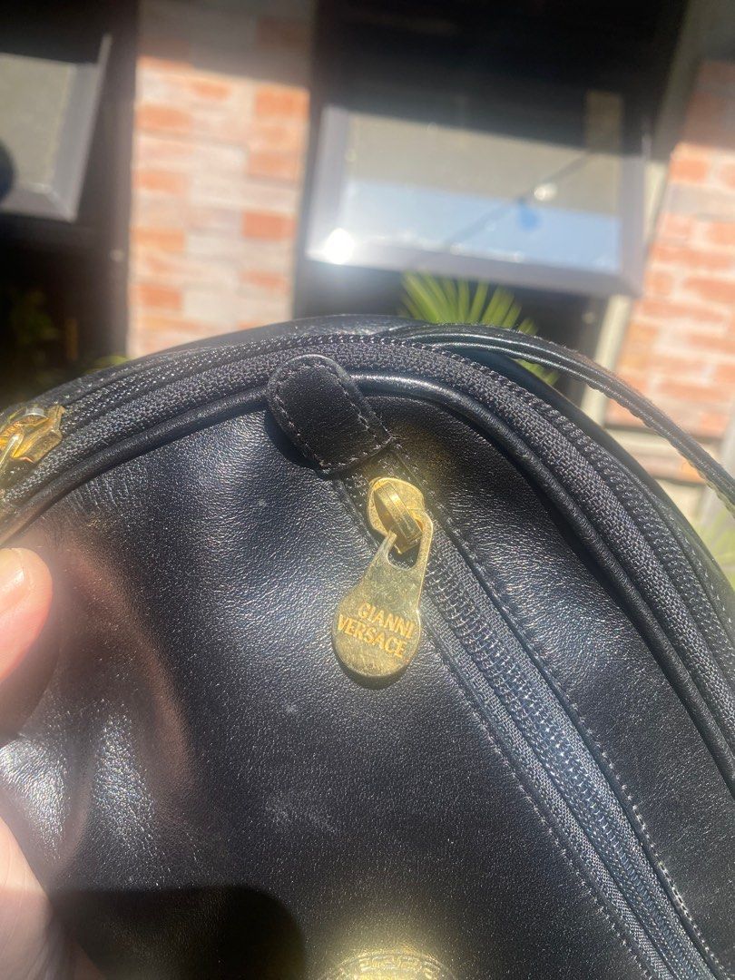 versace (Category: Luxury Bags & Wallets) located in Dagupan City. Submitted by lux_thrift (Listing ID 1212852892, Image 3). Description: SALE!!! vintage piece but looks like new well kept has minor pressmarks .