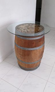 Wine barrel table with glass top