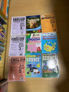 Assorted primary level assignment books