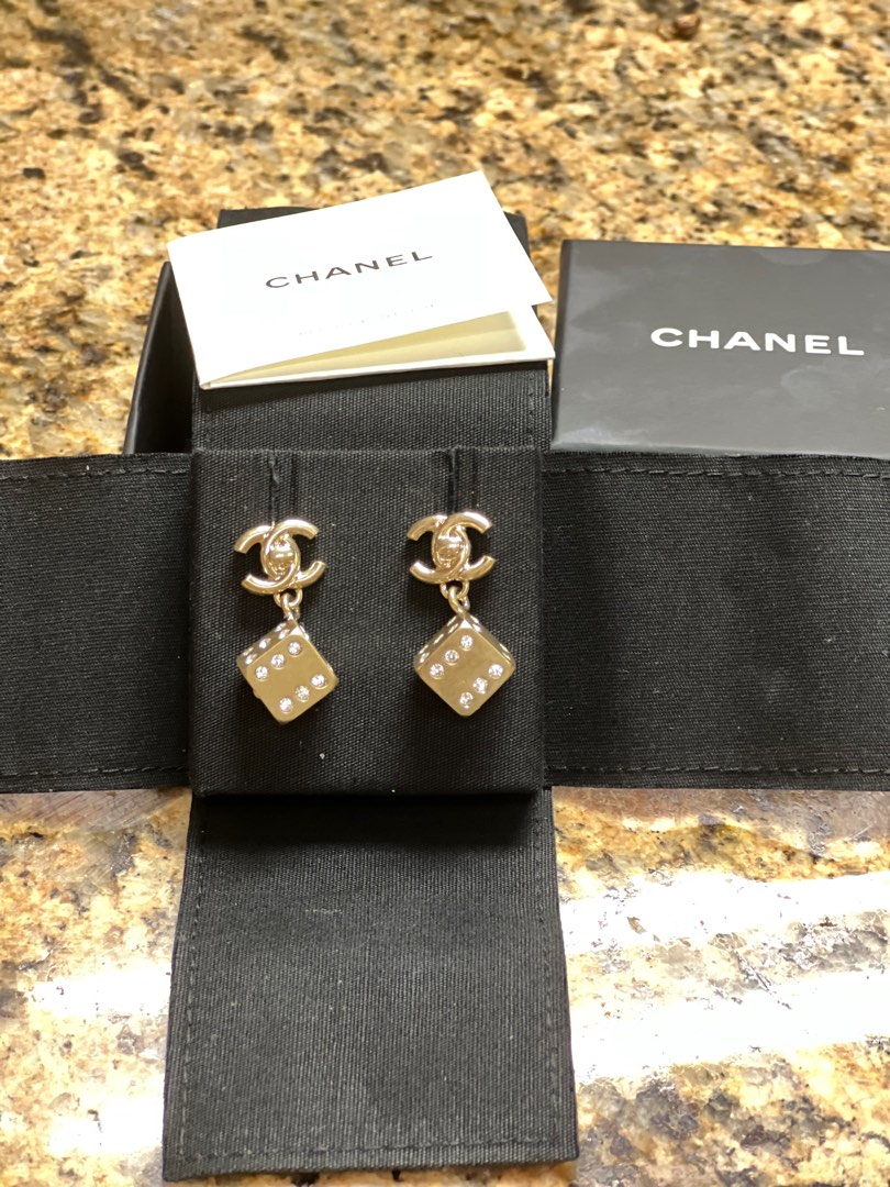 Chanel top dice earrings