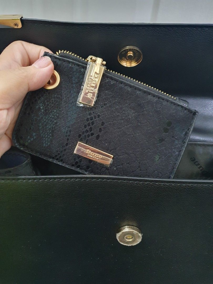 Dune Hand Bag with Strap and card holder (Category: Clutches) located in Manila. Submitted by red_g (Listing ID 1216317323, Image 3). Description: New with strap and card holders Good for night out RFS : decluttering.