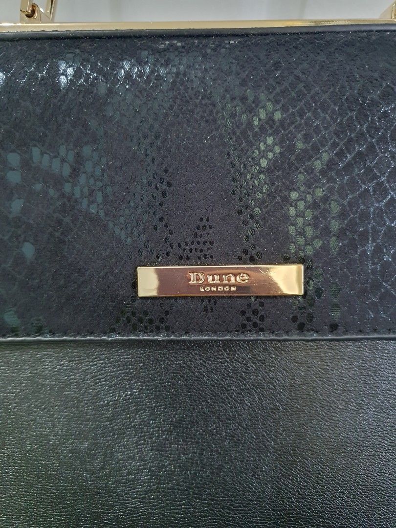 Dune Hand Bag with Strap and card holder (Category: Clutches) located in Manila. Submitted by red_g (Listing ID 1216317323, Image 2). Description: New with strap and card holders Good for night out RFS : decluttering.