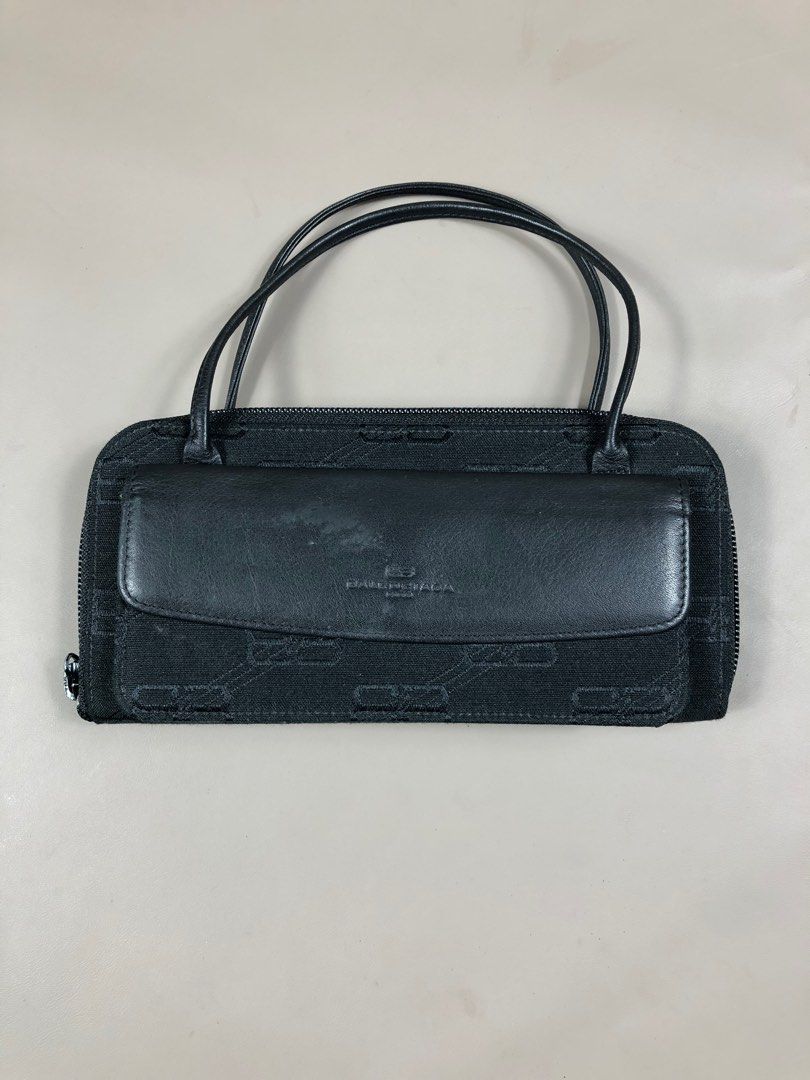 Vintage Balenciaga Small Hand bag (Category: Luxury Bags & Wallets) located in Manila. Submitted by revise.ph_ (Listing ID 1216438641, Image 1). Description: Vintage Balenciaga Small Hand bag 9/10 Condition Need Clean Ykk Zip Price 10,000 negotiable for sure buyer +shipping fee.