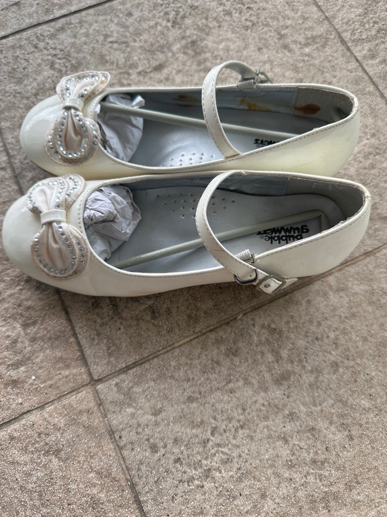 navy and white court shoes