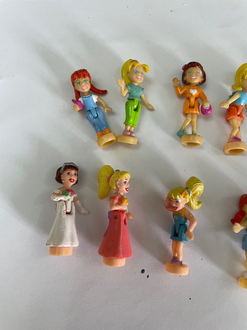 Magnetic polly pocket hotsell dolls
