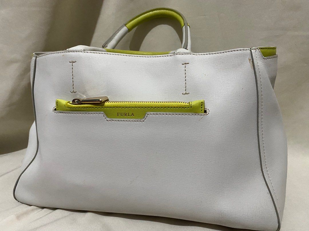 Authentic Furla Gray Tote Bag (Category: Luxury Bags & Wallets) located in Taytay. Submitted by prettybasic.clo (Listing ID 1216577785, Image 1). Description: Authentic Furla Tote Bag Size: Large Rfs: Decluttering .