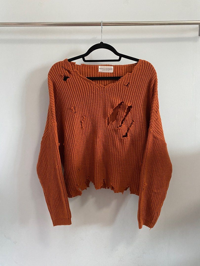 burnt orange distressed sweater