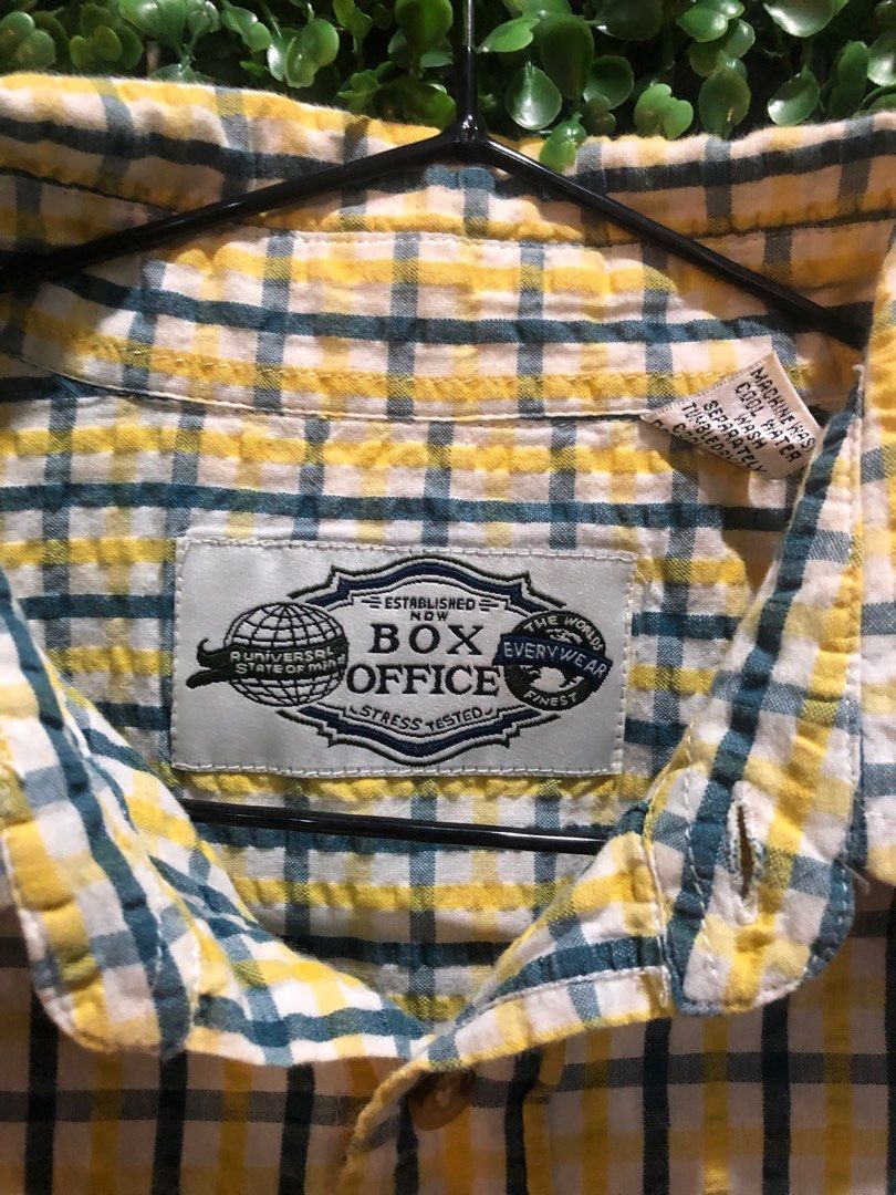 Checkered Short Sleeve Polo (Category: Tshirts & Polo Shirts ) located in Paranaque City. Submitted by thriftshop109 (Listing ID 1216597309, Image 2). Description: Checkered Short Sleeve Polo Brand: Box Office Made in UAE Preloved and Authentic Size: Large Length: 28” Width: 22” Issue: May minor na tastas (see picture) Rfs: Decluttering .