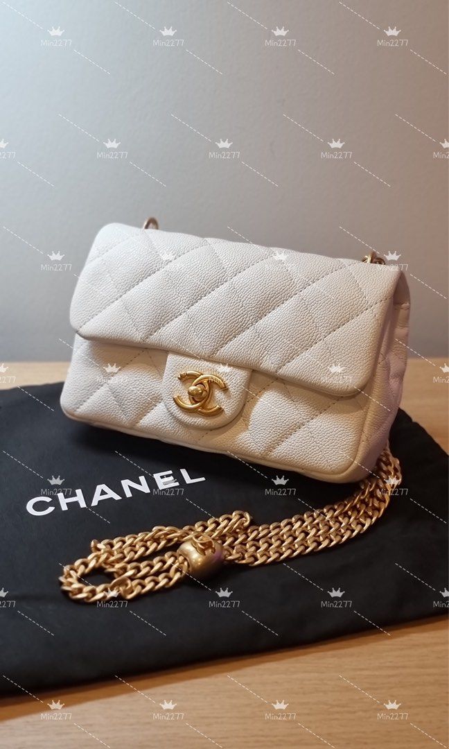 Lowest deal ‼️Chanel 23P heart pearl crush mini flap, Luxury, Bags &  Wallets on Carousell