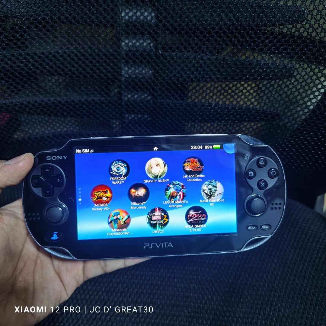 Ps vita oled henkaku 64gb full of games, Video Gaming, Video Game