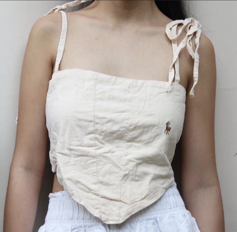 Reworked Ralph Lauren cami with strappy back (Category: Sleeveless) located in Binan City. Submitted by choomica (Listing ID 1216557138, Image 1). Description: Adjustable straps in the back..
