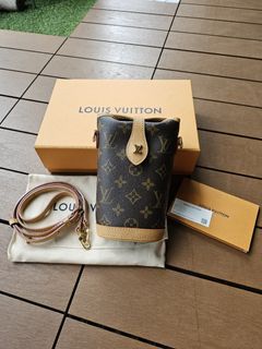 Louis Vuitton Fold me pouch (M80874) in 2023  Louis vuitton bag neverfull,  Everyday essentials products, Louis vuitton