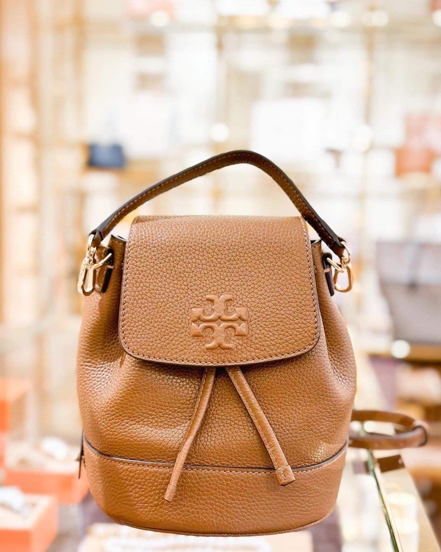 brown tory burch mini thea convertible bucket/backpack, Women's Fashion,  Bags & Wallets, Backpacks on Carousell