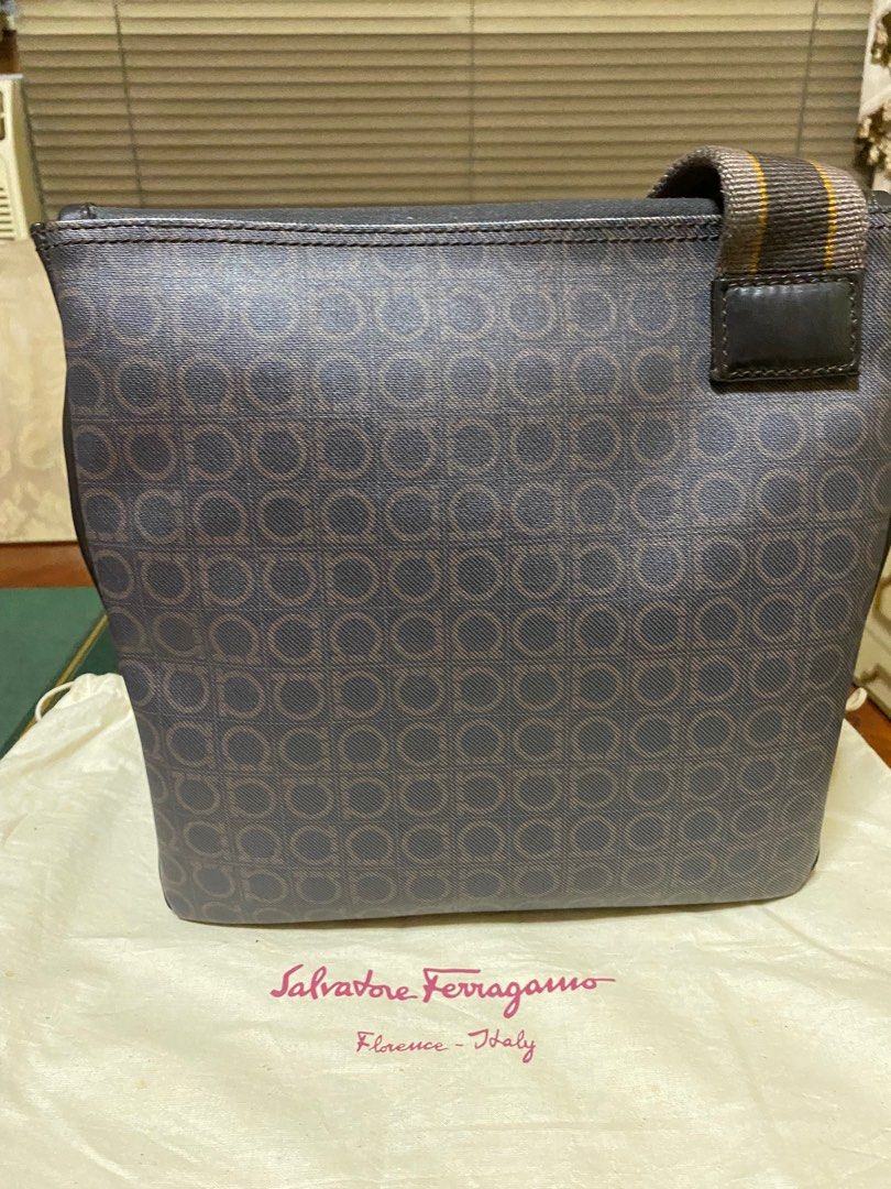 Ferragamo Mens Cross body bag (Category: Luxury Bags & Wallets) located in Manila. Submitted by jann.dy (Listing ID 1216781012, Image 2). Description: Ferragamo gancini logo bag Monogram canvas with brown leather trim 10 x 8 x 3/4 Made in Italy 9.8/10 condition With dust bag.