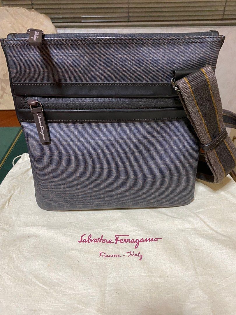 Ferragamo Mens Cross body bag (Category: Luxury Bags & Wallets) located in Manila. Submitted by jann.dy (Listing ID 1216781012, Image 1). Description: Ferragamo gancini logo bag Monogram canvas with brown leather trim 10 x 8 x 3/4 Made in Italy 9.8/10 condition With dust bag.