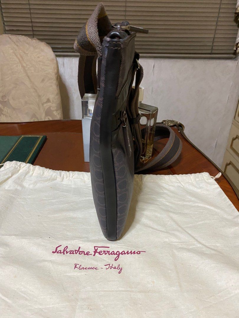 Ferragamo Mens Cross body bag (Category: Luxury Bags & Wallets) located in Manila. Submitted by jann.dy (Listing ID 1216781012, Image 3). Description: Ferragamo gancini logo bag Monogram canvas with brown leather trim 10 x 8 x 3/4 Made in Italy 9.8/10 condition With dust bag.
