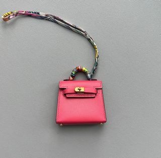 Hermes kelly micro charm, Luxury, Bags & Wallets on Carousell