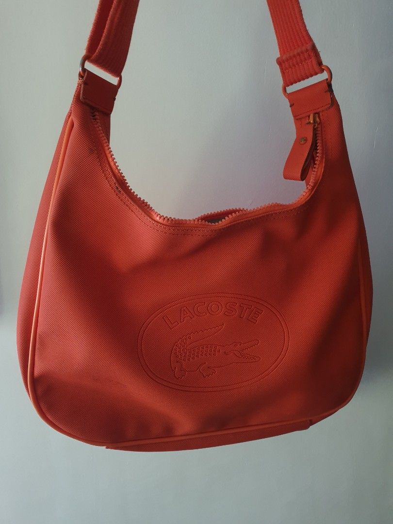 Lacoste hobo bag (Category: Luxury Bags & Wallets) located in Bacoor. Submitted by aikaclariz (Listing ID 1216752947, Image 2). Description: Original/Authentic Lacoste hobo bag • in very very good condition • no damages, as seen on photos •price negotiable.