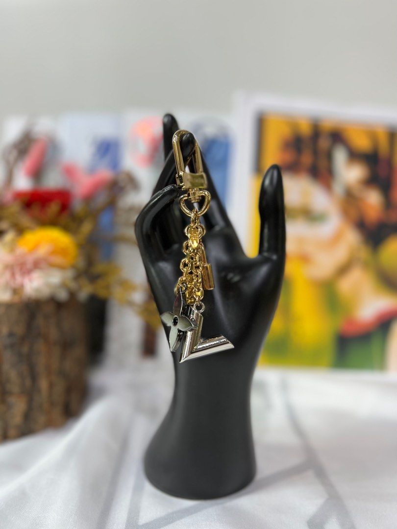 Vuitton charm outlet