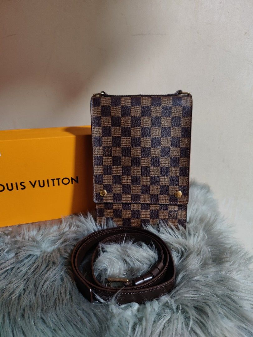 LV Damier Sling Bag (Category: Luxury Bags & Wallets) located in Marikina City. Submitted by noblecat_40a38b (Listing ID 1216812486, Image 1). Description: LV Damier Ebene Portobello 💯 Authentic Rank SA - Like New Detachable Strap Can fit phone and long wallet Free SF within NCR.