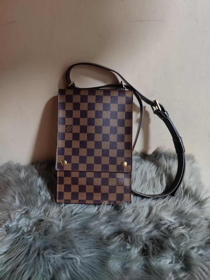 LV Damier Sling Bag (Category: Luxury Bags & Wallets) located in Marikina City. Submitted by noblecat_40a38b (Listing ID 1216812486, Image 3). Description: LV Damier Ebene Portobello 💯 Authentic Rank SA - Like New Detachable Strap Can fit phone and long wallet Free SF within NCR.