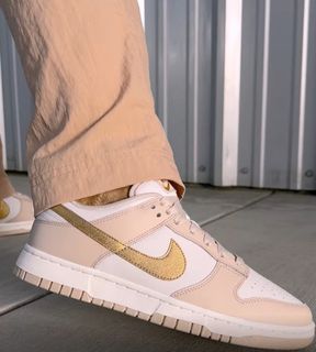 Gold swoosh on sale