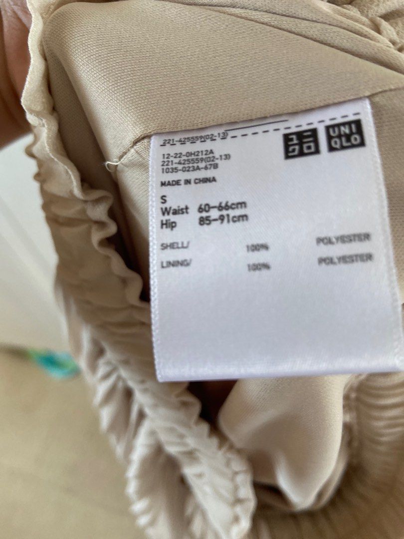 Uniqlo Cream Pleated Pants on Carousell