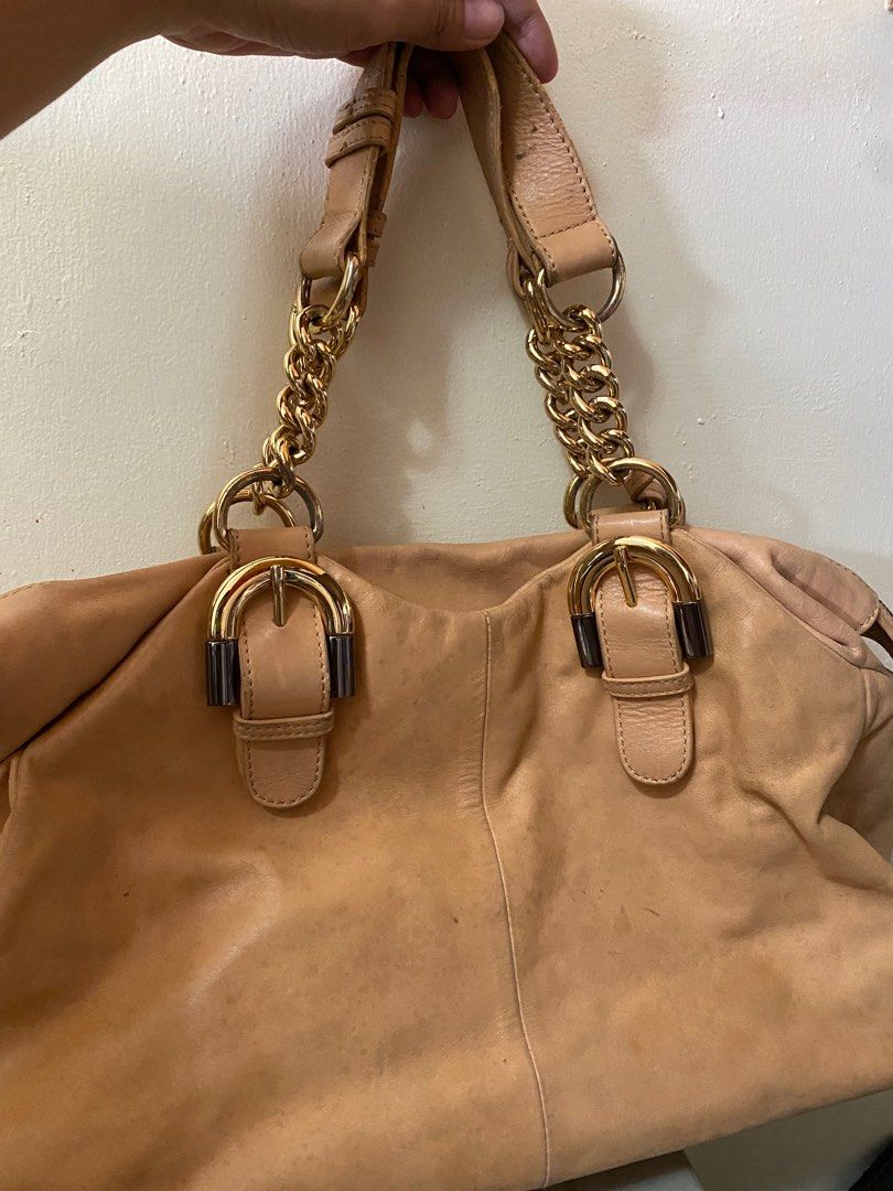 Authentic Badgley Mischka Shoulder Bag (Category: Luxury Bags & Wallets) located in Makati City. Submitted by etrastrinai (Listing ID 1216881195, Image 2). Description: Flaw: discolorations (can be restored) Bought in the US for $299 or around 15k pesos Selling price: 10,000 (a steal price! ❤️).