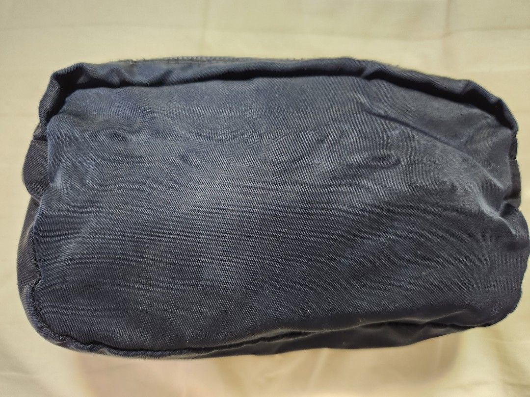 Authentic Prada makeup pouch (Category: Luxury Bags & Wallets) located in Quezon City. Submitted by myprelovedfindsph (Listing ID 1216908226, Image 3). Description: Authentic Prada makeup pouch, Good condition. See pics for details..