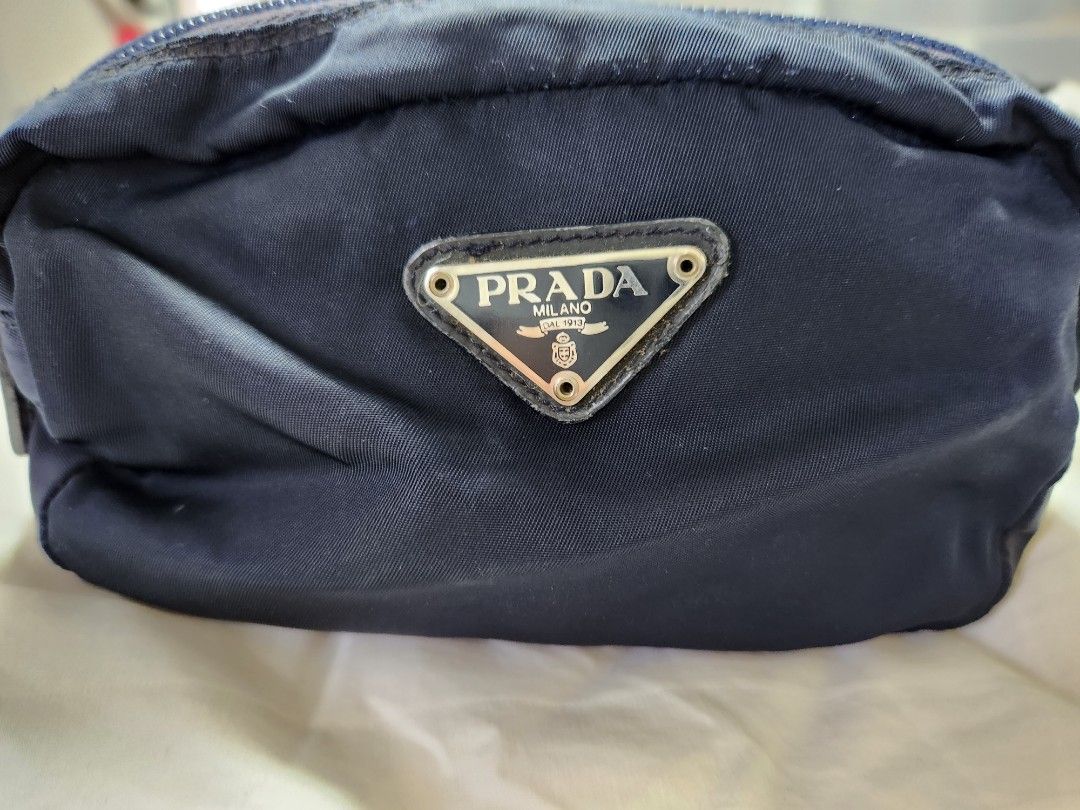 Authentic Prada makeup pouch (Category: Luxury Bags & Wallets) located in Quezon City. Submitted by myprelovedfindsph (Listing ID 1216908226, Image 1). Description: Authentic Prada makeup pouch, Good condition. See pics for details..