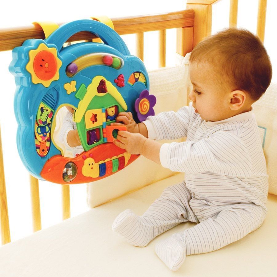 BRUIN TOYS R US MUSICAL COT ACTIVITY CENTRE