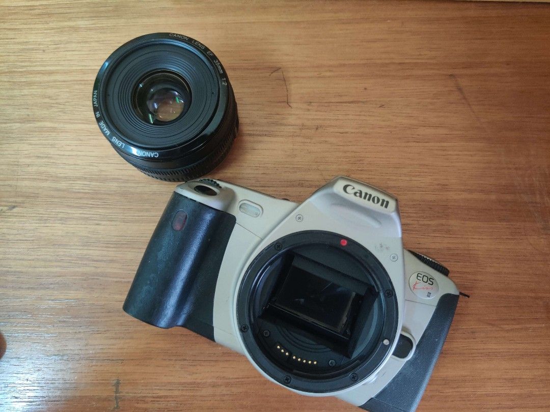 Canon EOS Kiss III with date back, Photography, Cameras on Carousell