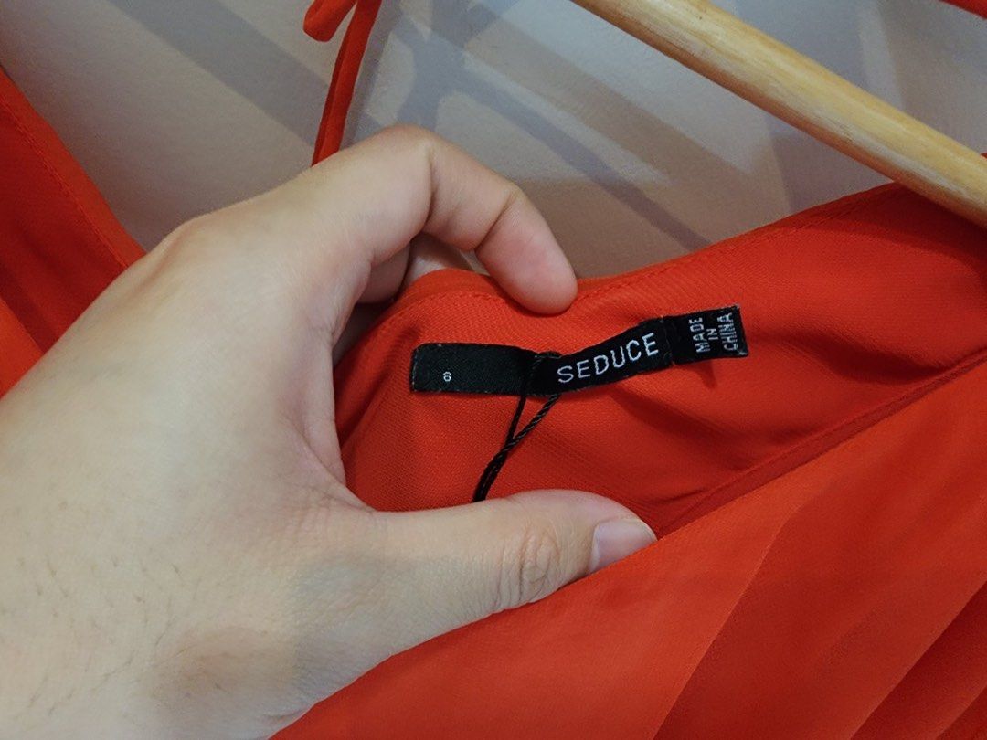 Flowy sexy red orange dress (Category: Dresses) located in Quezon City. Submitted by sudo8 (Listing ID 1216865618, Image 2). Description: High quality Fits S to M Personal favorite ❤️ .