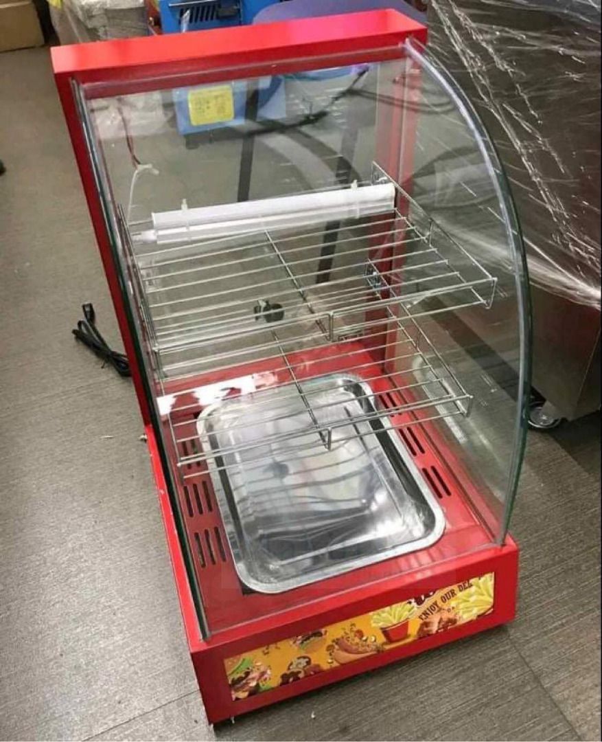 Food Warmer Display Showcase 2p-1 (Category: Other Kitchen Appliances) located in Manila. Submitted by makinaryageneral.merchandise (Listing ID 1216959880, Image 3). Description: Stainless Steel Rack Food Warming Case Electric Buffet Food Warmer 1.Fashionable design with curved glass. 2.Easy thermostatically controlled,. 3.Water reservoir to provide humidity for food moisture. 4.Ideal for snack bars, convenience stores, bakeries, kiosks etc. .