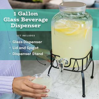 https://media.karousell.com/media/photos/products/2023/2/23/instock_glass_drink_dispenser__1677143713_22539990_progressive_thumbnail