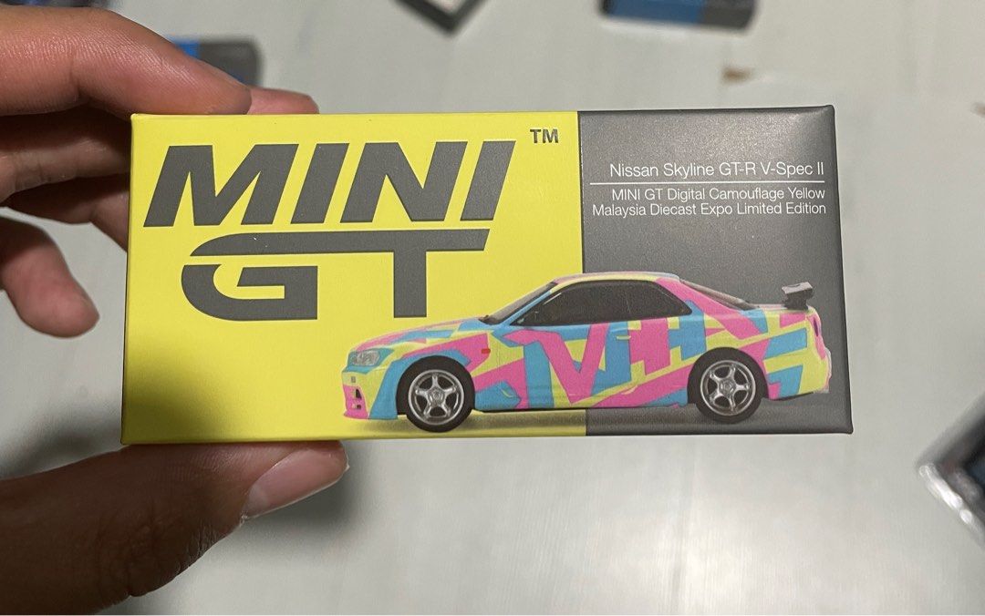 Mini Gt Skyline Gt R R34 Mini GT Nissan Skyline GT-R R34 V-Spec ll Digital Camouflage Yellow ...