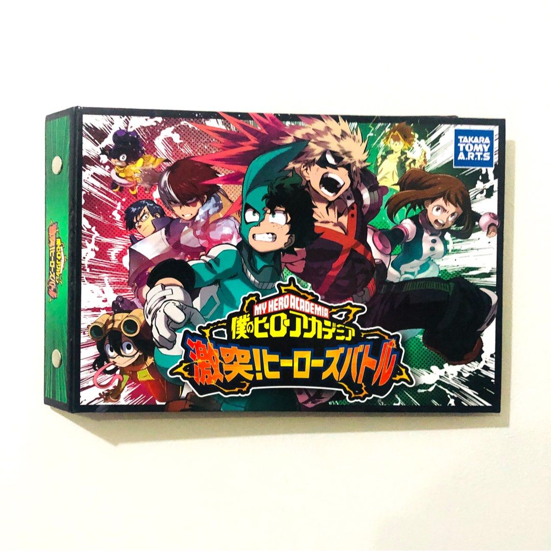 My hero academia Card binder (Category: Stationery & School Supplies) located in Manila. Submitted by clovercollectibles (Listing ID 1217031760, Image 1). Description: 🍀Item: My hero academia Card binder 🍀24 sheets can hold 3 cards per sheet 🍀Anime: MHA / My hero academia/ BNHA / Boku no hero academia 🍀Character: izuku Midoriya, Bakugo katsuki, all might, Ochako uraraka, tenya iida, Midnight, Shoto todoroki 🍀Condition: Brand new but has slig