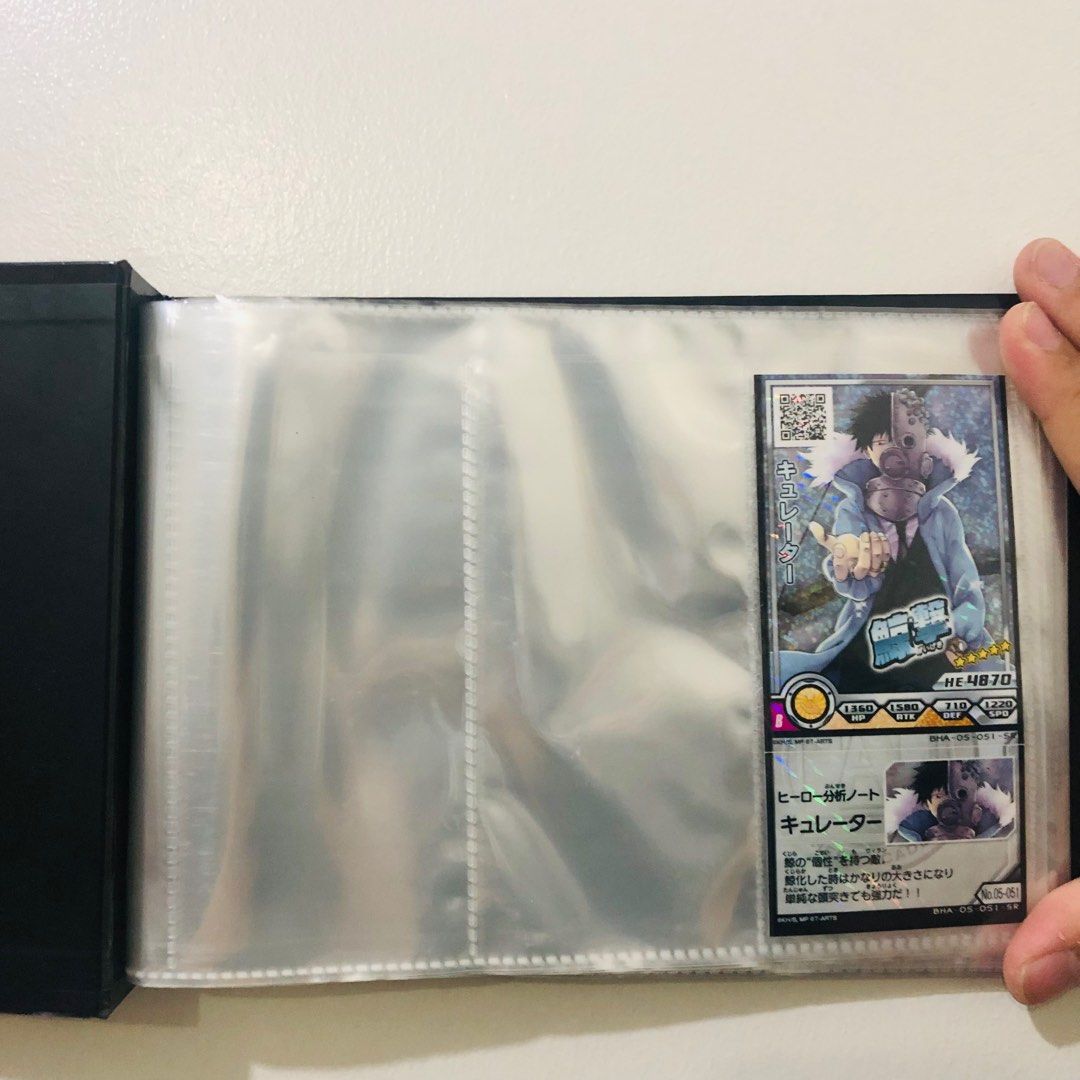 My hero academia Card binder (Category: Stationery & School Supplies) located in Manila. Submitted by clovercollectibles (Listing ID 1217031760, Image 3). Description: 🍀Item: My hero academia Card binder 🍀24 sheets can hold 3 cards per sheet 🍀Anime: MHA / My hero academia/ BNHA / Boku no hero academia 🍀Character: izuku Midoriya, Bakugo katsuki, all might, Ochako uraraka, tenya iida, Midnight, Shoto todoroki 🍀Condition: Brand new but has slig